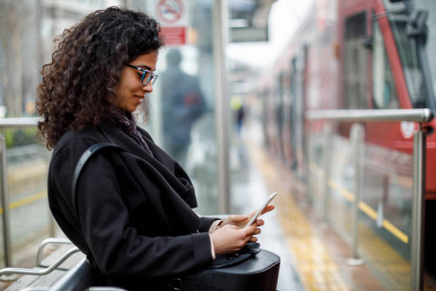 istock Woman waiting for train at the station 982637564