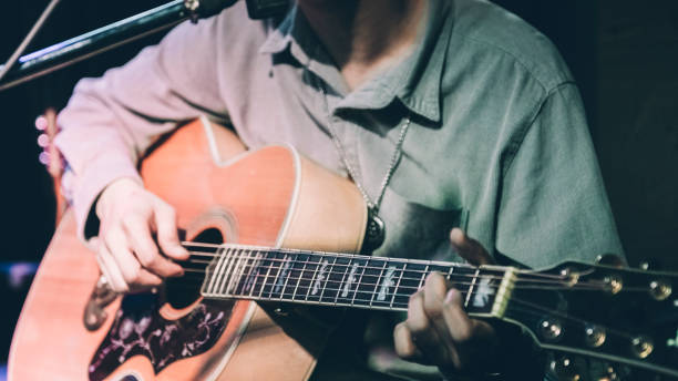 istock A male singer plays the guitar 982663400