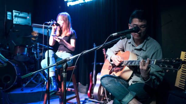 istock A band in Chinese music bar is singing. 982665740