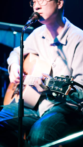 istock A male singer in Chinese music bar is singing. 982665764