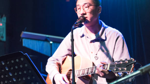istock A male singer in Chinese music bar is singing. 982665770