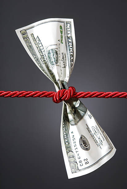 istock Tug of war with dollar 98269420