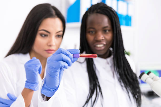 istock Coworkers in laboratory 982704418