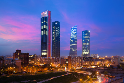Madrid Four Towers financial district skyline at twilight in Madrid, Spain.