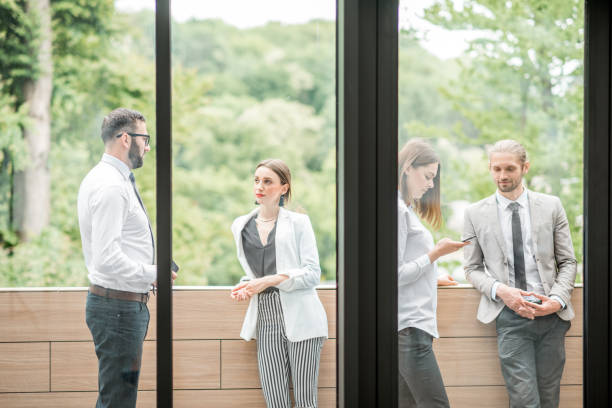 istock Business people on the office balcony during a break 982718622