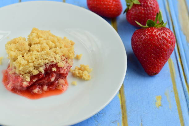 istock Portion of strawberry crumble on a plate 982727110