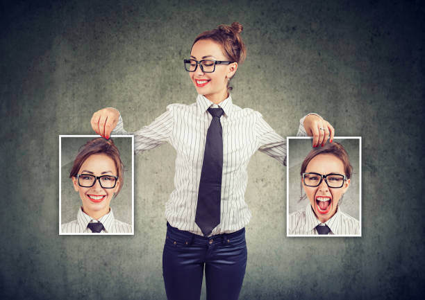 istock Cheerful woman showing different photos with emotions 982740044
