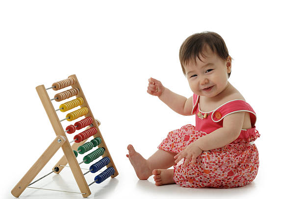 istock Baby Girl with abacus 98274779