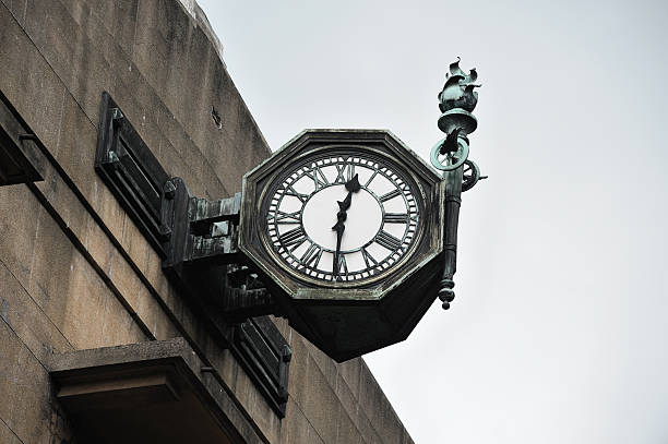 Bronze Clock  color image roman numeral rusty time stock pictures, royalty-free photos & images