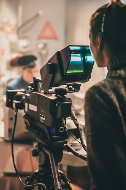 istock Behind the scene. Actor in front of the camera 982751990