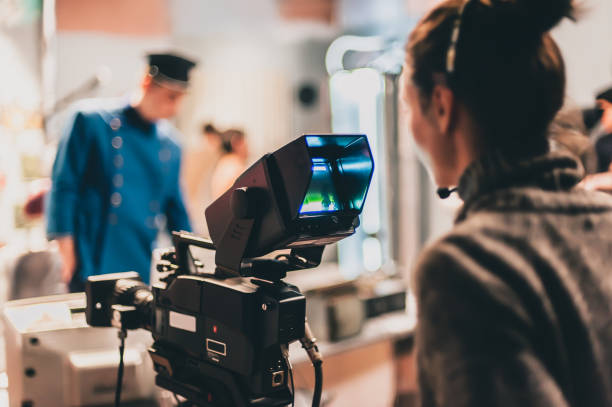 istock Behind the scene. Actor in front of the camera 982752098