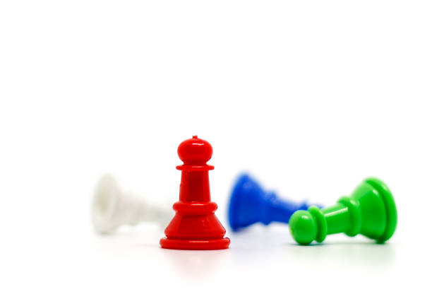 istock Selective focus of red chess pawn on blurred others against white background for leadership concept 982757600