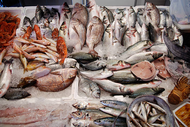 istock fishmarket with many different fresh fishes 98276357