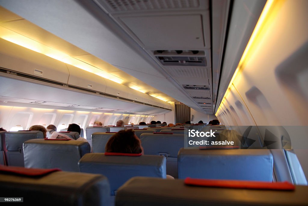 All'interno di un aereo in volo - Foto stock royalty-free di Abitacolo