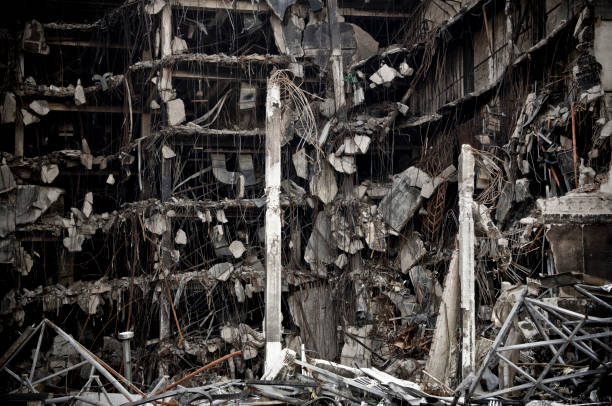 istock Completely destroyed big concrete building in city nearly collapse 982764442