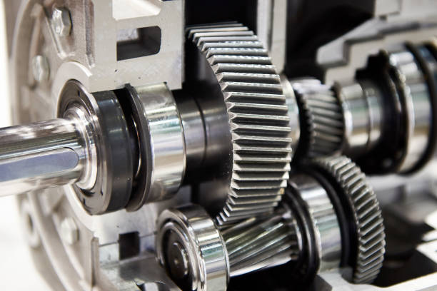 Gears of in-line helical gearbox Gears of in-line helical gearbox in section helical stock pictures, royalty-free photos & images