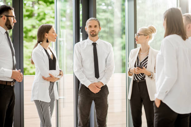istock Business people talking together indoors 982769084