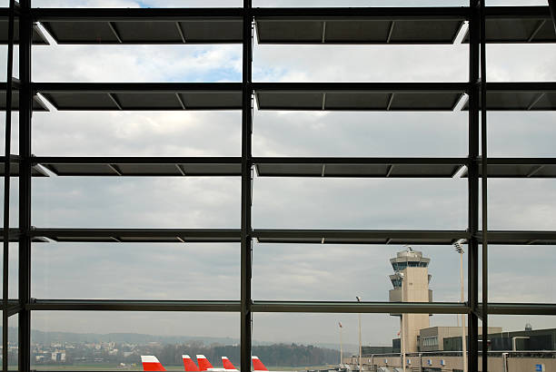 istock looking through window at Airport Zurich 98277247
