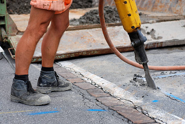 istock working roadman and jackhammer at roadworks 98277558
