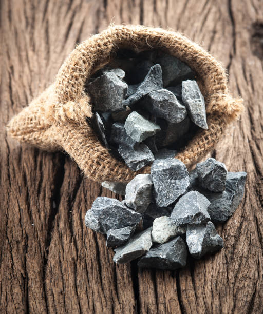 istock Pale of crushed stone on wood 982784142