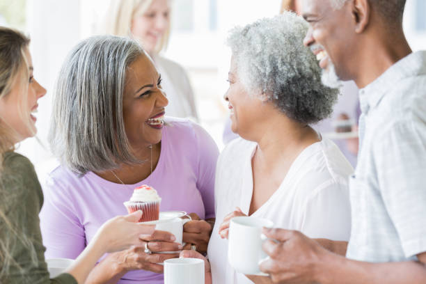 istock Group of people chat during charity event 982800776