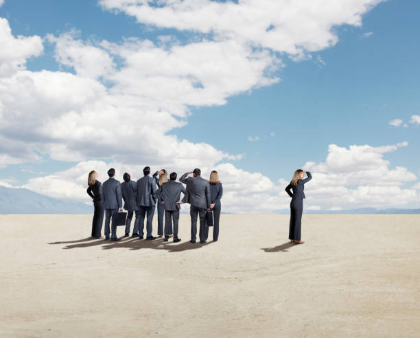istock Businesswoman Looks In Different Direction 982819298