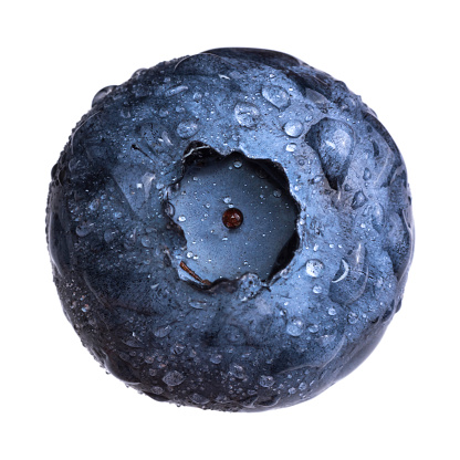 Fresh blueberry with water drops isolated on white background.
