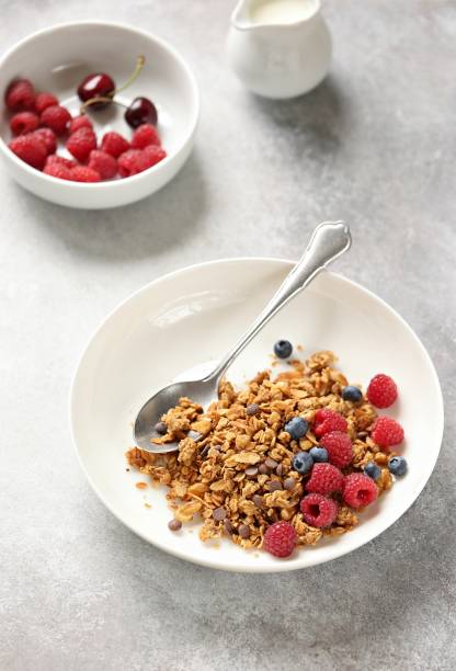 istock Healthy breakfast with granola and seasonal berries 982823280