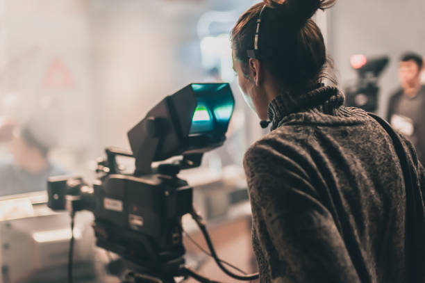 istock Behind scene. Multiple camera. Cameraman shooting film scene with camera 982823334