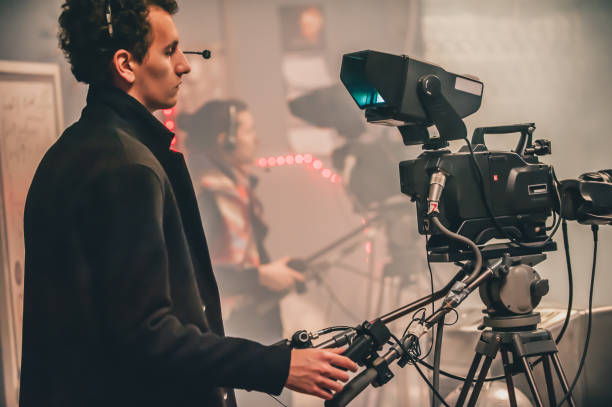 istock Behind scene. Multiple camera. Cameraman shooting film scene with camera 982823398