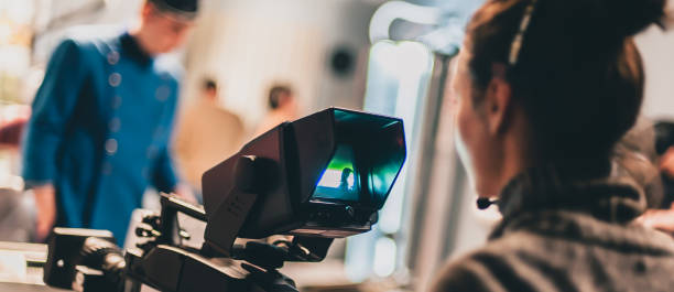 istock Behind the scene. Actor in front of the camera 982825822