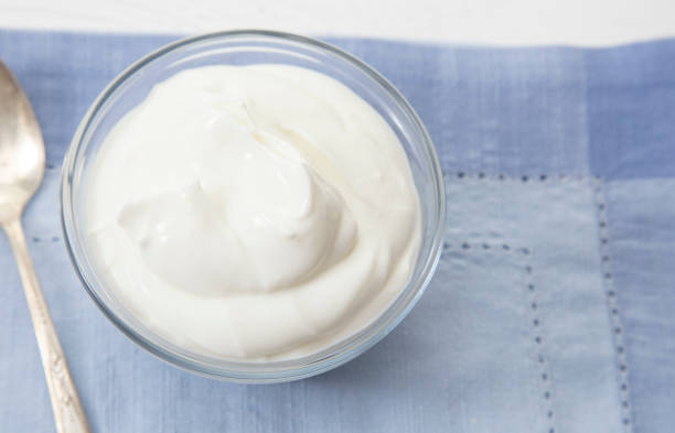 istock Plain Greek Yogurt in a Bowl for Breakfast 982825946