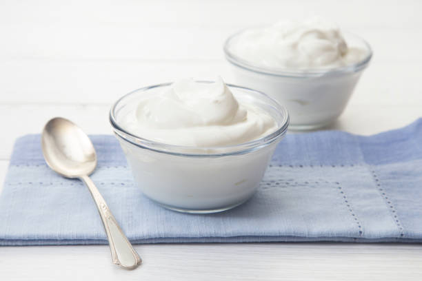 istock Plain Greek Yogurt in a Bowl for Breakfast 982826146