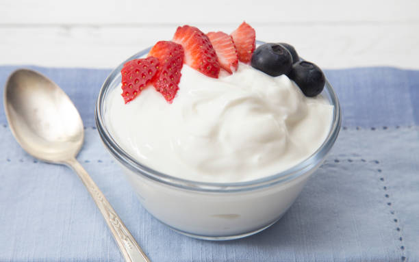 istock Greek Yogurt Topped with Fresh Berries 982826728