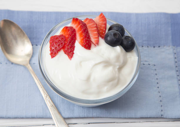 istock Greek Yogurt Topped with Fresh Berries 982826742