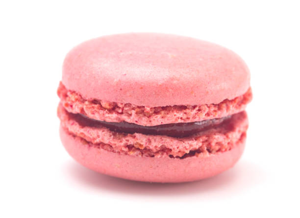 Single Pink French Macarons on a White Background