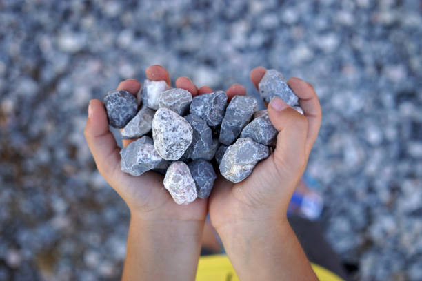 istock Children plays with stones 982864234