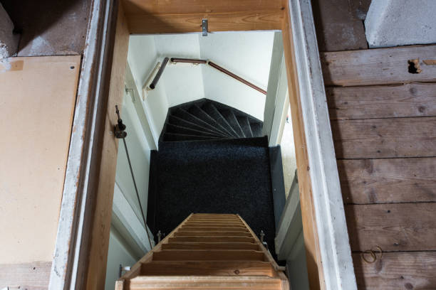 istock A wooden ladder in the attic in a rustic interior 982864732