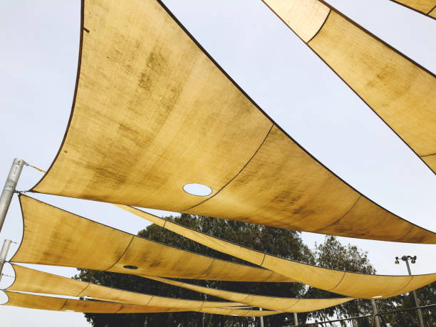 istock Awning in the midday sun against the sky. 982865264