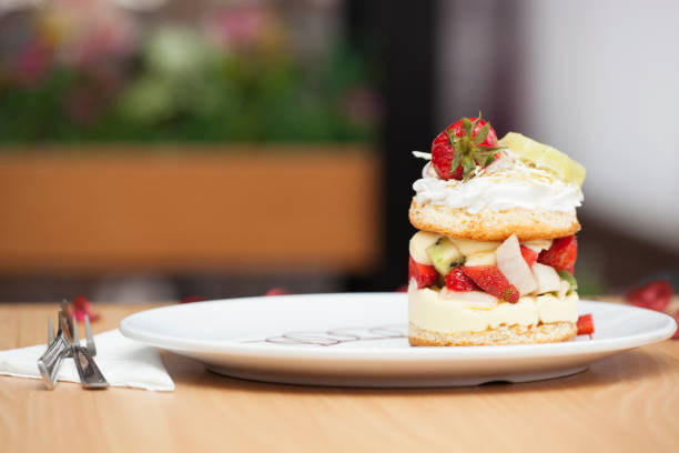 istock Strawberry cream cake with fruits 982881910