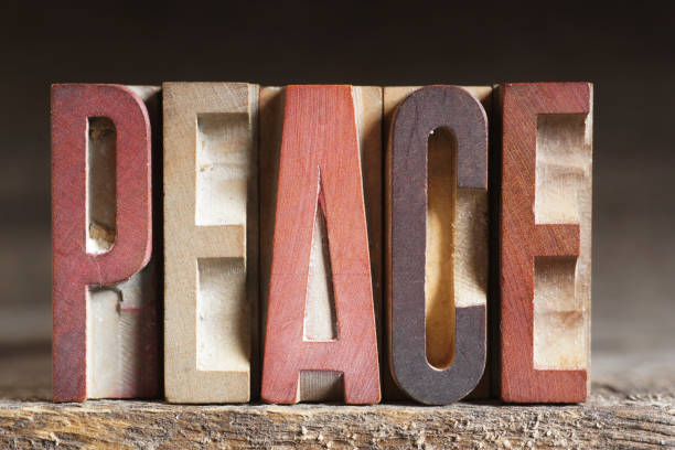 istock PEACE - Single Word made up from Old Wooden Letters 982896246