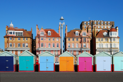 istock Colored beach huts at Brighton. East Sussex. England 98290065