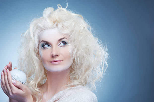 istock Beautiful snow queen with a christmas ball 98290953