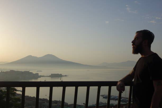 istock Panorama of Naples with man making a selfie 982910646