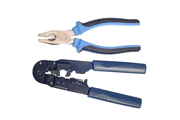 Crimping tool and pliers isolated stock photo