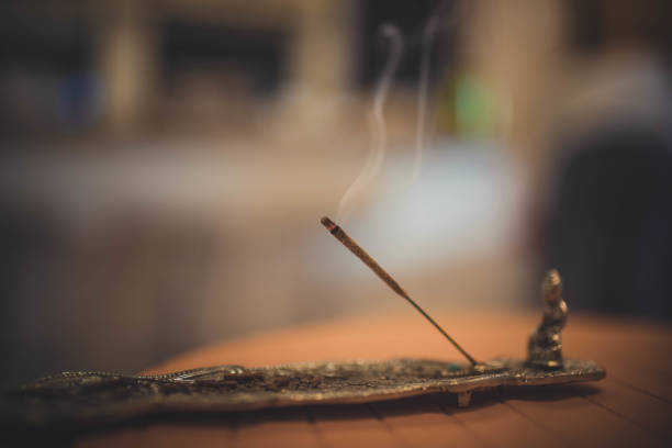 incense sticks with rose flowers leaves. Close up