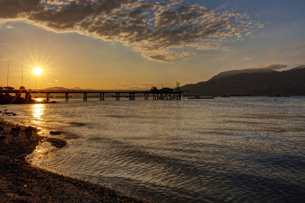 istock Beach and pier at sunset, Vancouver, BC, Canada 982935416