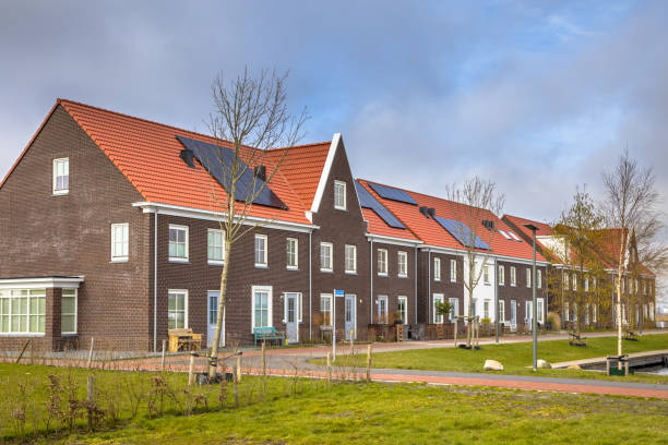 istock Modern row houses with solar panels 982959380