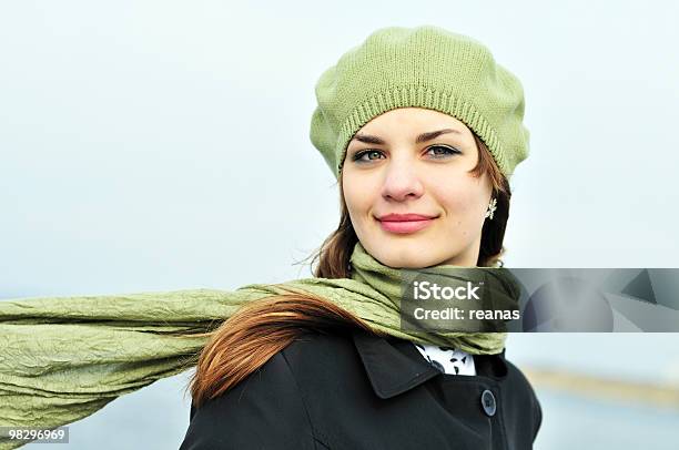 Woman In Green Hat And Green Scarf On A Windy Day Stock Photo - Download Image Now - Adolescence, Adult, Beautiful People