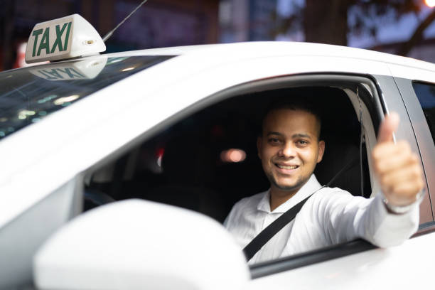 Taxi Driver Thumbs Up / Satifaction Portraits taxi driver photos stock pictures, royalty-free photos & images
